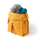 Hide and Hammer Honey iconic roll top with yarn