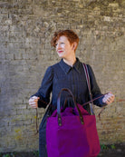 Hide and Hammer Overnight Drawstring Bag Mulberry modelled