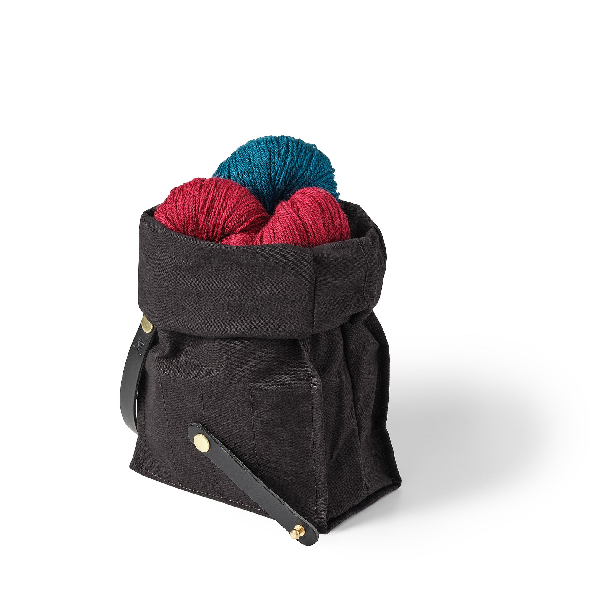 Hide and Hammer black small roll top yarn
