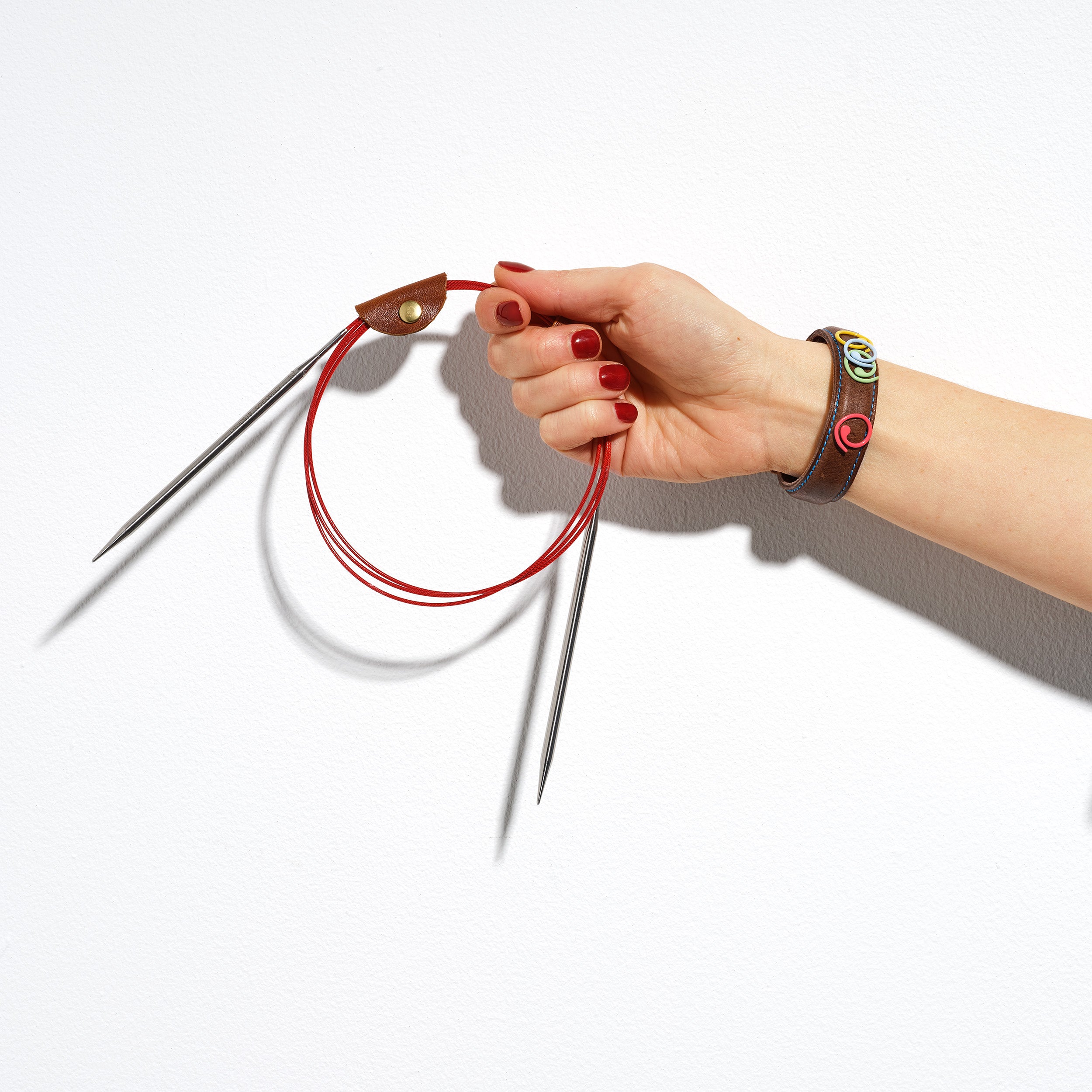 Hide and Hammer Magnetic leather cuff modelled with needles and markers